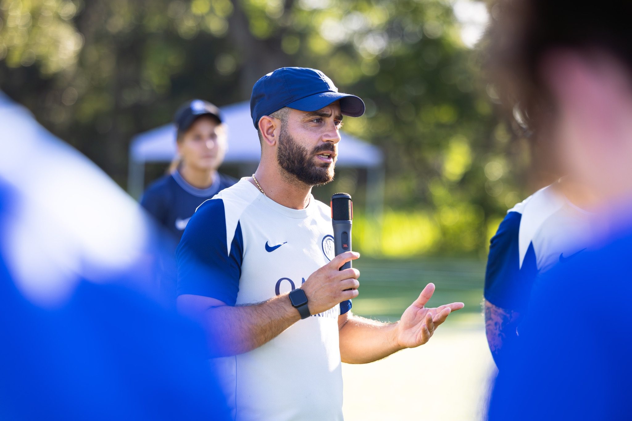 Inter Academy Milan head coach speaking to youth soccer players at camp in Deltona Florida